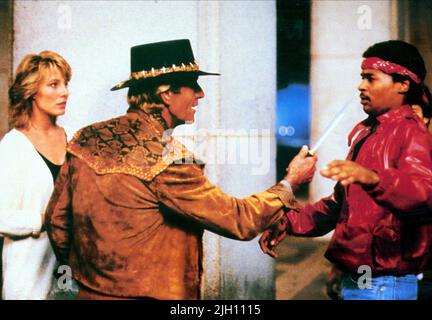 KOZLOWSKI, HOGAN, HOLMES, CROCODILE DUNDEE, 1986 Stockfoto