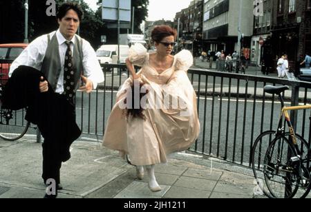 GRANT, COLEMAN, VIER HOCHZEITEN UND EIN BEGRÄBNIS, 1994 Stockfoto