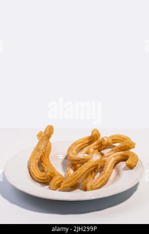 Traditionelle spanische Wüste oder Frühstück „Churros“ Stockfoto