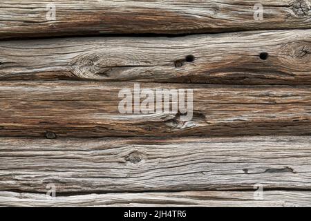 Alter Holzbretter Hintergrund. Rustikale Holzplanken mit Flecken und Rissen. Stockfoto