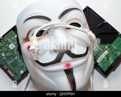 Guy Fawkes mögen Hacker-Maske im anonymen Stil. Hervorragende Bilder für Anwendungen im Bereich Cybersicherheit. Stockfoto