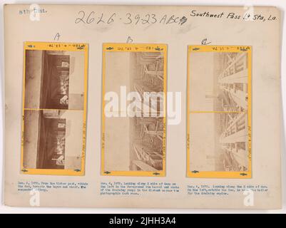 LA - Southwest Pass. Southwest Pass Light Station, Louisiana. Blick entlang der Südseite des Staudamms; links im Vordergrund der Lauf und der schate der Abflusspumpe; in der fernen Ecke der fotografische dunkle Raum. Stockfoto