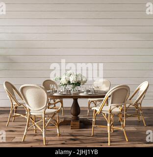 Esszimmer im Küstendesign mit Tisch. Weiße Wand im gemütlichen Innenhintergrund. Hampton-Stil 3d-Renderdarstellung. Stockfoto
