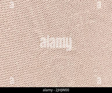 Merino beige Wolle Strickstruktur für das Design. Gestrickter Baumwollstoff Hintergrund in beige Creme Farbe. Stockfoto