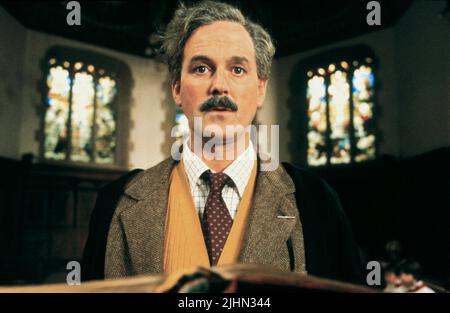 JOHN CLEESE, MONTY PYTHON'S DER SINN DES LEBENS, 1983 Stockfoto