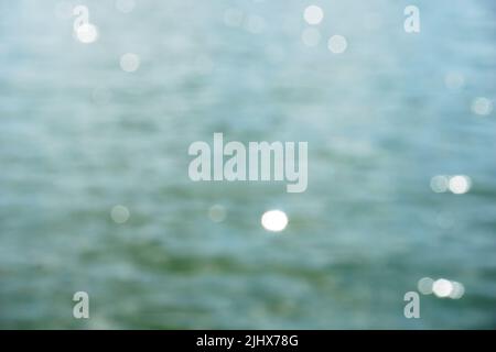 Sonne reflektiert in Wasseroberfläche - Bokeh-Effekt Stockfoto