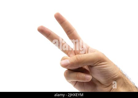 Erwachsene Hand macht Frieden Zeichen isoliert auf weißem Hintergrund. Zwei Zeichen von Hand machen Stockfoto