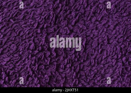 Lila Wolle Textur Fell Hintergrund Muster warm abstrakt weich Material flauschig Tier Natur Haut violett. Stockfoto