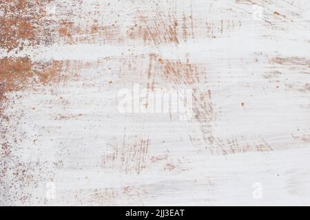 Weiße Farbe abstraktes Muster auf der Oberfläche eines alten rostigen metallischen Textur Stahl Hintergrund rostbraun. Stockfoto