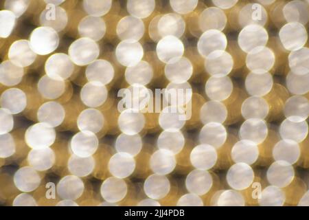 Das goldene Licht Bokeh Hintergrund Stockfoto
