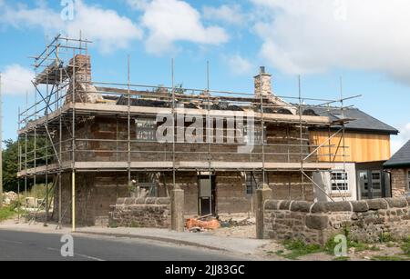 Ein altes Steinhaus, das renoviert und erweitert wird, in der Nähe von Glasson, Lancashire, England, Großbritannien Stockfoto