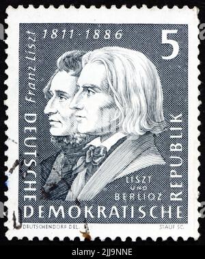 DEUTSCHLAND - UM 1961: Eine in Deutschland gedruckte Briefmarke zeigt Franz Franz Franz Franz Franz Franz und Hector Berlioz, 150.. Jahrestag der Geburt von Franz Franz Franz Franz Franz Franz Franz Franz, Komponist, um Stockfoto