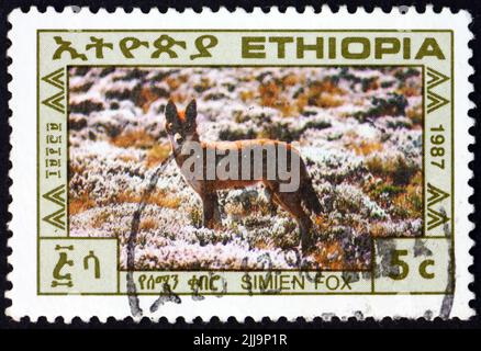 ÄTHIOPIEN - UM 1987: Eine in Äthiopien gedruckte Marke zeigt den Simien Fox, canis simiensis, einen aus dem äthiopischen Hochland stammenden Hund aus der Zeit um 1987 Stockfoto