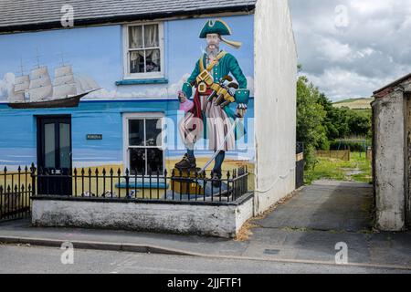 Ein Wandbild eines Piraten auf einem Häuschen in Borth, Ceredigion, Wales Stockfoto