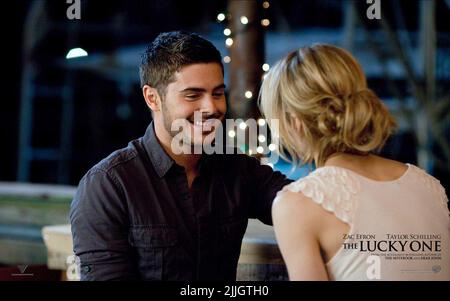 ZAC EFRON, Taylor, Schilling, Plakat, das GLÜCKLICHE, 2012 Stockfoto