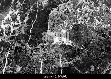 Schöner natürlicher schwarzer Marmorhintergrund mit abstraktem weißem Muster. Stockfoto