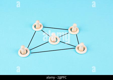Group of people connecting through a web, business networking, communication and teamwork Stockfoto