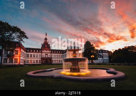 Das Schloss Philippsruhe bei Sonnenuntergang in Hanau, Deutschland Stockfoto