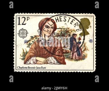 Roman Jane Eyre Scene der englischen Schriftstellerin Charlotte Bronte (1816-1855), um 1981. Vintage Poststempel von Großbritannien isoliert auf schwarzem Hintergrund. Stockfoto