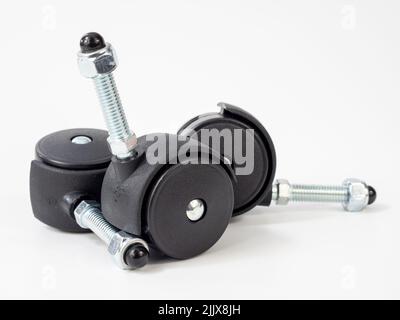 Möbel Rad für Bürostuhl isoliert auf weißem Hintergrund. Nahaufnahme. Stockfoto