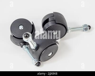 Möbel Rad für Bürostuhl isoliert auf weißem Hintergrund. Nahaufnahme. Stockfoto