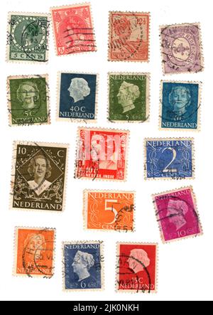 Eine Auswahl alter Briefmarken aus den Niederlanden Stockfoto