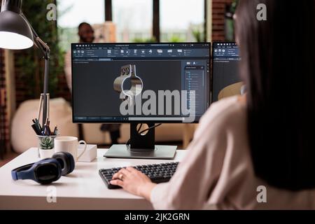 Industriearbeiter Entwicklung von Maschinen Getriebe Produkt, Engineering industriellen Turbinen Produktion auf Computer zu Hause. Freiberuflicher Mitarbeiter in der Baumanufaktur mit kreativer Software. Stockfoto