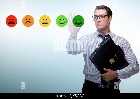 Geschäftsmann im Kunden-Feedback-Konzept Stockfoto