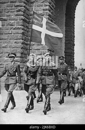 Die Nazi-deutschen Elitetruppen die Waffen-SS hatte viele Abteilungen ausländischer Freiwilliger, die an den nationalsozialismus glaubten. Hier marschieren Mitglieder des Freien Korps Dänemark im Juli 1941 in Deutschland Stockfoto