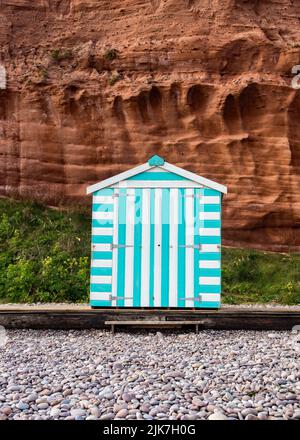 Eine einzelne Strandhütte auf der Single eines Devon Beach Stockfoto