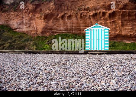 Eine einzelne Strandhütte auf der Single eines Devon Beach Stockfoto