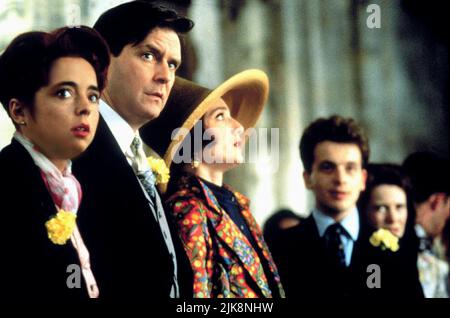 Charlotte Coleman, James Fleet & Kristin Scott Thomas Film: Four Weddings and A Funeral (UK 1994) Charaktere: Scarlett,Tom,Fiona Regie: Mike Newell 20 January 1994 **WARNUNG** Dieses Foto ist nur für den redaktionellen Gebrauch bestimmt und unterliegt dem Copyright für VON der Film- oder Produktionsfirma beauftragte FILME UND/oder den Fotografen und kann nur von Publikationen im Zusammenhang mit der Bewerbung des oben genannten Films reproduziert werden. Eine obligatorische Gutschrift für DIE BEARBEITUNG VON TITELFILMEN ist erforderlich. Der Fotograf sollte auch bei Bekanntwerden des Fotos gutgeschrieben werden. Eine kommerzielle Nutzung kann ohne schriftliche Genehmigung fr Stockfoto