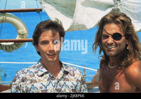 Martin Short & Kurt Russell Film: Captain Ron (1992) Charaktere: Martin Harvey & Captain Ron Regie: Thom Eberhardt 25. September 1992 **WARNUNG** Dieses Foto ist nur für redaktionelle Zwecke bestimmt und unterliegt dem Copyright von TOUCHSTONE und/oder des Fotografen, der von der Film- oder Produktionsfirma beauftragt wurde und darf nur durch Publikationen im Zusammenhang mit der Bewerbung des oben genannten Films reproduziert werden. Ein obligatorischer Credit to TOUCHSTONE ist erforderlich. Der Fotograf sollte auch bei Bekanntwerden des Fotos gutgeschrieben werden. Ohne schriftliche Genehmigung der Film Company kann keine kommerzielle Nutzung gewährt werden. Stockfoto