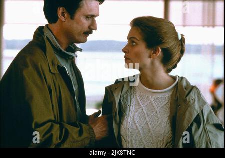 Patrick Bergin & Julia Roberts Film: Sleeping With The Enemy (1991) Characters: Martin Burney & Laura Burney  Director: Joseph Ruben 08 February 1991   **WARNING** This Photograph is for editorial use only and is the copyright of 20 CENTURY FOX and/or the Photographer assigned by the Film or Production Company and can only be reproduced by publications in conjunction with the promotion of the above Film. A Mandatory Credit To 20 CENTURY FOX is required. The Photographer should also be credited when known. No commercial use can be granted without written authority from the Film Company. Stock Photo