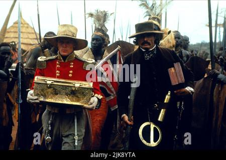 Iain Glen & Patrick Bergin Film: Mountains of the Moon (USA 1990) Regie: Bob Rafelson 16 February 1990 **WARNUNG** Dieses Foto ist nur für den redaktionellen Gebrauch bestimmt und unterliegt dem Copyright von CAROLCO BILDERN und/oder dem Fotografen, der von der Film- oder Produktionsfirma beauftragt wurde und darf nur von Publikationen im Zusammenhang mit der Bewerbung des oben genannten Films reproduziert werden. Eine obligatorische Gutschrift für CAROLCO-BILDER ist erforderlich. Der Fotograf sollte auch bei Bekanntwerden des Fotos gutgeschrieben werden. Ohne schriftliche Genehmigung der Film Company kann keine kommerzielle Nutzung gewährt werden. Stockfoto