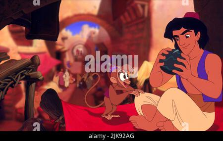 Abu & Aladdin Film: Aladdin (USA 1992) Regie: Ron Clements & John Musker 08 November 1992 **WARNUNG** Dieses Foto ist nur für redaktionelle Zwecke bestimmt und unterliegt dem Copyright von WALT DISNEY BILDERN und/oder dem Fotografen, der von der Film- oder Produktionsfirma beauftragt wurde und darf nur durch Publikationen im Zusammenhang mit der Bewerbung des oben genannten Films reproduziert werden. Eine obligatorische Gutschrift für BILDER VON WALT DISNEY ist erforderlich. Der Fotograf sollte auch bei Bekanntwerden des Fotos gutgeschrieben werden. Ohne schriftliche Genehmigung der Film Company kann keine kommerzielle Nutzung gewährt werden. Stockfoto