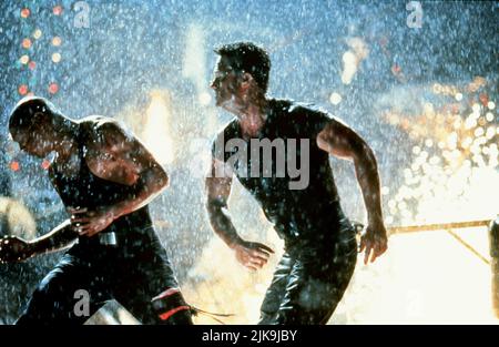 Jason Scott Lee & Kurt Russell Film: Soldier (1998) Charaktere: Caine 607 & Todd Regie: Paul W.S. Anderson 23 October 1998 **WARNUNG** Dieses Foto ist nur für redaktionelle Zwecke bestimmt und unterliegt dem Copyright von WARNER BROS und/oder des Fotografen, der von der Film- oder Produktionsfirma beauftragt wurde, und kann nur von Publikationen im Zusammenhang mit der Bewerbung des oben genannten Films reproduziert werden. Eine obligatorische Gutschrift an WARNER BROS ist erforderlich. Der Fotograf sollte auch bei Bekanntwerden des Fotos gutgeschrieben werden. Ohne schriftliche Genehmigung der Film Company kann keine kommerzielle Nutzung gewährt werden. Stockfoto