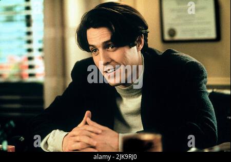 Hugh Grant Film: Nine Months (USA 1995) Charaktere: Samuel Faulkner Regie: Chris Columbus 12 July 1995 **WARNUNG** Dieses Foto ist nur für den redaktionellen Gebrauch bestimmt und unterliegt dem Copyright von 20. CENTURY FOX und/oder des Fotografen, der von der Film- oder Produktionsfirma beauftragt wurde und kann nur durch Publikationen im Zusammenhang mit der Bewerbung des oben genannten Films reproduziert werden. Eine obligatorische Gutschrift an 20. CENTURY FOX ist erforderlich. Der Fotograf sollte auch bei Bekanntwerden des Fotos gutgeschrieben werden. Ohne schriftliche Genehmigung der Film Company kann keine kommerzielle Nutzung gewährt werden. Stockfoto