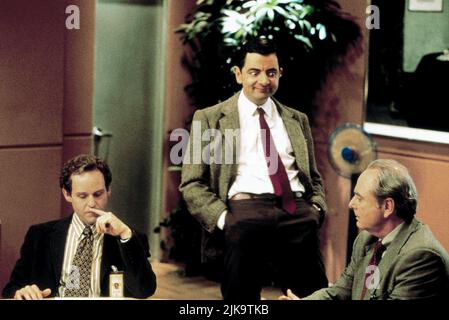 Peter Macnicol, Rowan Atkinson, Harris Yulin Film: Bean (UK/USA 1997) Charaktere: David Langley,Mr. Bean,George Grierson Regie: Mel Smith 03 July 1997 **WARNUNG** Dieses Foto ist nur für den redaktionellen Gebrauch bestimmt und unterliegt dem Copyright des VON der Film- oder Produktionsfirma beauftragten ARBEITSTITELS und/oder Fotografen und kann nur durch Publikationen im Zusammenhang mit der Bewerbung des oben genannten Films reproduziert werden. Ein Pflichtnachweis für DEN ARBEITSTITEL ist erforderlich. Der Fotograf sollte auch bei Bekanntwerden des Fotos gutgeschrieben werden. Ohne schriftliche Genehmigung der Film Company kann keine kommerzielle Nutzung gewährt werden. Stockfoto