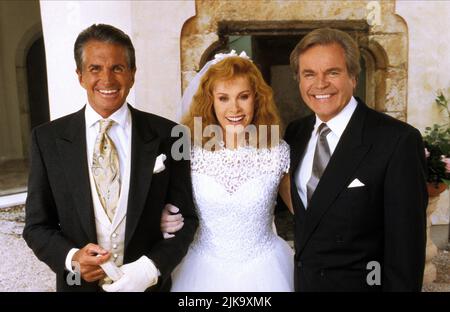 George Hamilton, Stefanie Powers & Robert Wagner Film: Hart to Hart: Till Death Do US Hart (TV-Film) Charaktere: Karl von Ostenberg, Jennifer Hart, Jonathan Hart USA 1996, Regie: Tom Mankiewicz 25. August 1996 **WARNUNG** Dieses Foto ist nur für den redaktionellen Gebrauch bestimmt und unterliegt dem Copyright des FERNSEHENS COLUMBIA PICTURES und/oder des Fotografen, der von der Film- oder Produktionsfirma beauftragt wurde, und kann nur von Publikationen im Zusammenhang mit der Bewerbung des oben genannten Films reproduziert werden. Eine obligatorische Gutschrift für COLUMBIA PICTURES TELEVISION ist erforderlich. Der Fotograf sollte auch bei Bekanntwerden des Fotos gutgeschrieben werden Stockfoto