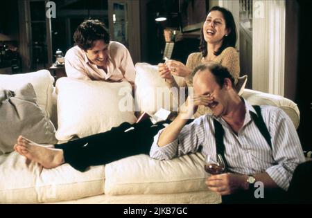 Hugh Grant, Gina McKee & Tim Mcinnerny Film: Notting Hill (UK/USA 1999) Charaktere: William Thacker,Bella,Max Regie: Roger Michell 13 May 1999 **WARNUNG** Dieses Foto ist nur für redaktionelle Zwecke bestimmt und unterliegt dem Copyright von POLYGRAM FILMUNTERHALTUNG und/oder des Fotografen, der von der Film- oder Produktionsfirma beauftragt wurde und kann nur durch Publikationen im Zusammenhang mit der Bewerbung des oben genannten Films reproduziert werden. Eine obligatorische Gutschrift für DIE VON POLYGRAM GEFILMTE UNTERHALTUNG ist erforderlich. Der Fotograf sollte auch bei Bekanntwerden des Fotos gutgeschrieben werden. Ohne schriftliche Genehmigung kann keine kommerzielle Nutzung gewährt werden Stockfoto