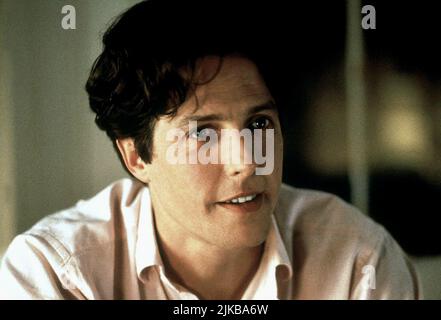 Hugh Grant Film: Notting Hill (UK/USA 1999) Charaktere: William Thacker Regie: Roger Michell 13 May 1999 **WARNUNG** Dieses Foto ist nur für redaktionelle Zwecke bestimmt und unterliegt dem Copyright von POLYGRAM FILMUNTERHALTUNG und/oder des Fotografen, der von der Film- oder Produktionsfirma beauftragt wurde und kann nur durch Publikationen im Zusammenhang mit der Bewerbung des oben genannten Films reproduziert werden. Eine obligatorische Gutschrift für DIE VON POLYGRAM GEFILMTE UNTERHALTUNG ist erforderlich. Der Fotograf sollte auch bei Bekanntwerden des Fotos gutgeschrieben werden. Ohne schriftliche Genehmigung der Film Company kann keine kommerzielle Nutzung gewährt werden. Stockfoto