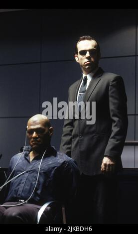 Laurence Fishburne & Hugo Weaving Film: The Matrix (USA/AUS 1999) Charaktere: Morpheus, Agent Smith Regie: The Wachowski Brothers 31 March 1999 **WARNUNG** Dieses Foto ist nur für redaktionelle Zwecke bestimmt und unterliegt dem Copyright von WARNER BROS. Und/oder des Fotografen, der von der Film- oder Produktionsfirma beauftragt wurde und nur durch Publikationen im Zusammenhang mit der Bewerbung des oben genannten Films reproduziert werden kann. Eine obligatorische Gutschrift an WARNER BROS. Ist erforderlich. Der Fotograf sollte auch bei Bekanntwerden des Fotos gutgeschrieben werden. Ohne schriftliche Genehmigung der Film Company kann keine kommerzielle Nutzung gewährt werden. Stockfoto