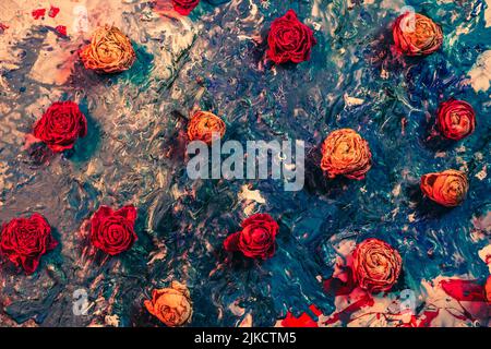 Blumenkunst Hintergrund rot orange getrocknete Rose Knospen Stockfoto