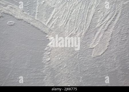 Eine Nahaufnahme von Eiskristallen auf der Oberfläche des Sees Stockfoto