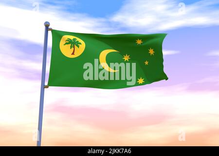 Winkende Flagge der Cocos (Keeling) Inseln mit Chrom-Fahnenmast in blauem Himmel winkt im Wind. Hochauflösendes Flag mit Klarheit. 3D Abbildung Stockfoto