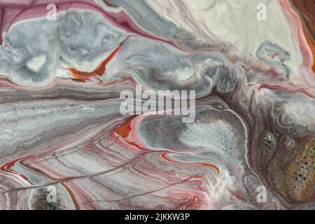 Die abstrakte Malerei mit Acryl mit Fluid Pour Stockfoto