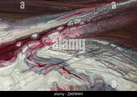 Die abstrakte Malerei mit Acryl mit Fluid Pour Stockfoto