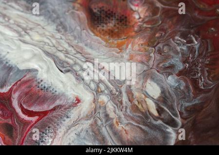 Die abstrakte Malerei mit Acryl mit Fluid Pour Stockfoto