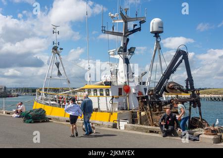 Angelboot in Amble Harbour, Amble, Northumberland, England, Vereinigtes Königreich Stockfoto